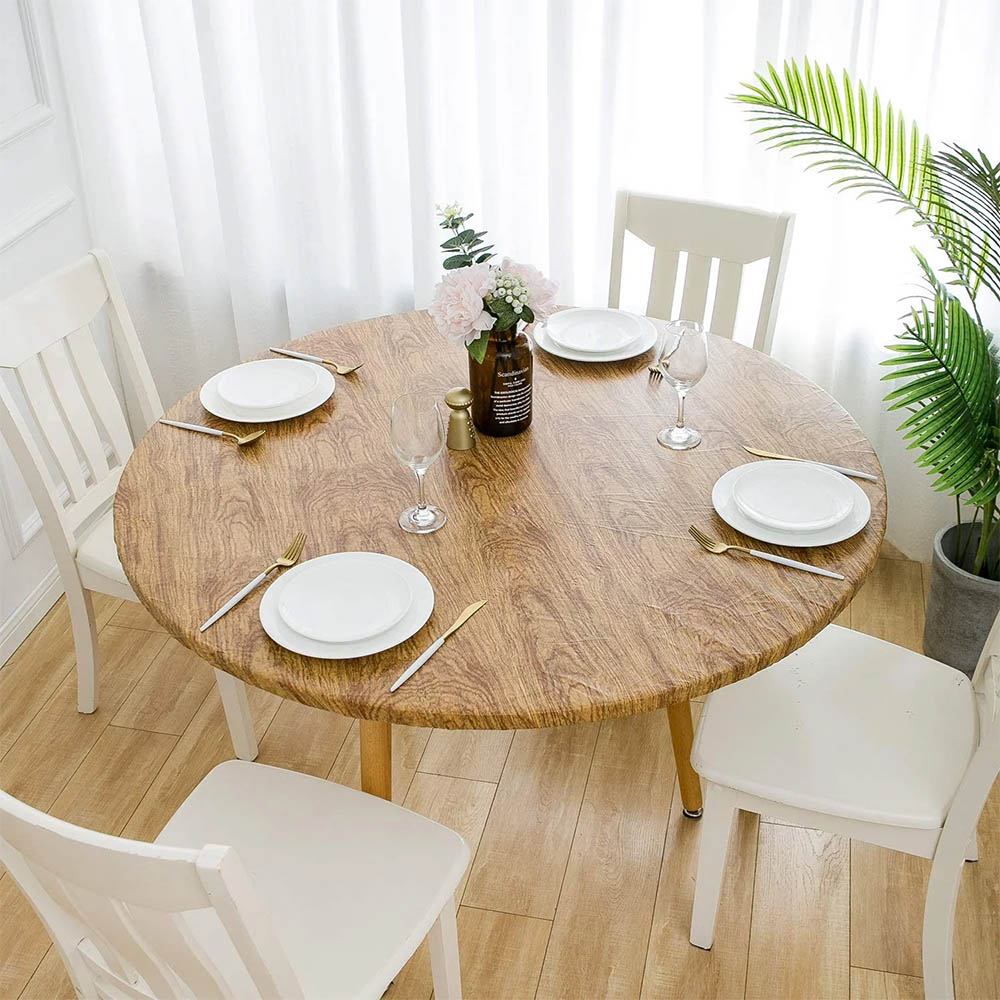 bàn ăn gỗ cao su mặt bàn hình tròn